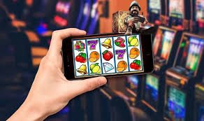 Yggdrasil slot game interface showing animated reels and bonus feature trigger on qq88asia mobile